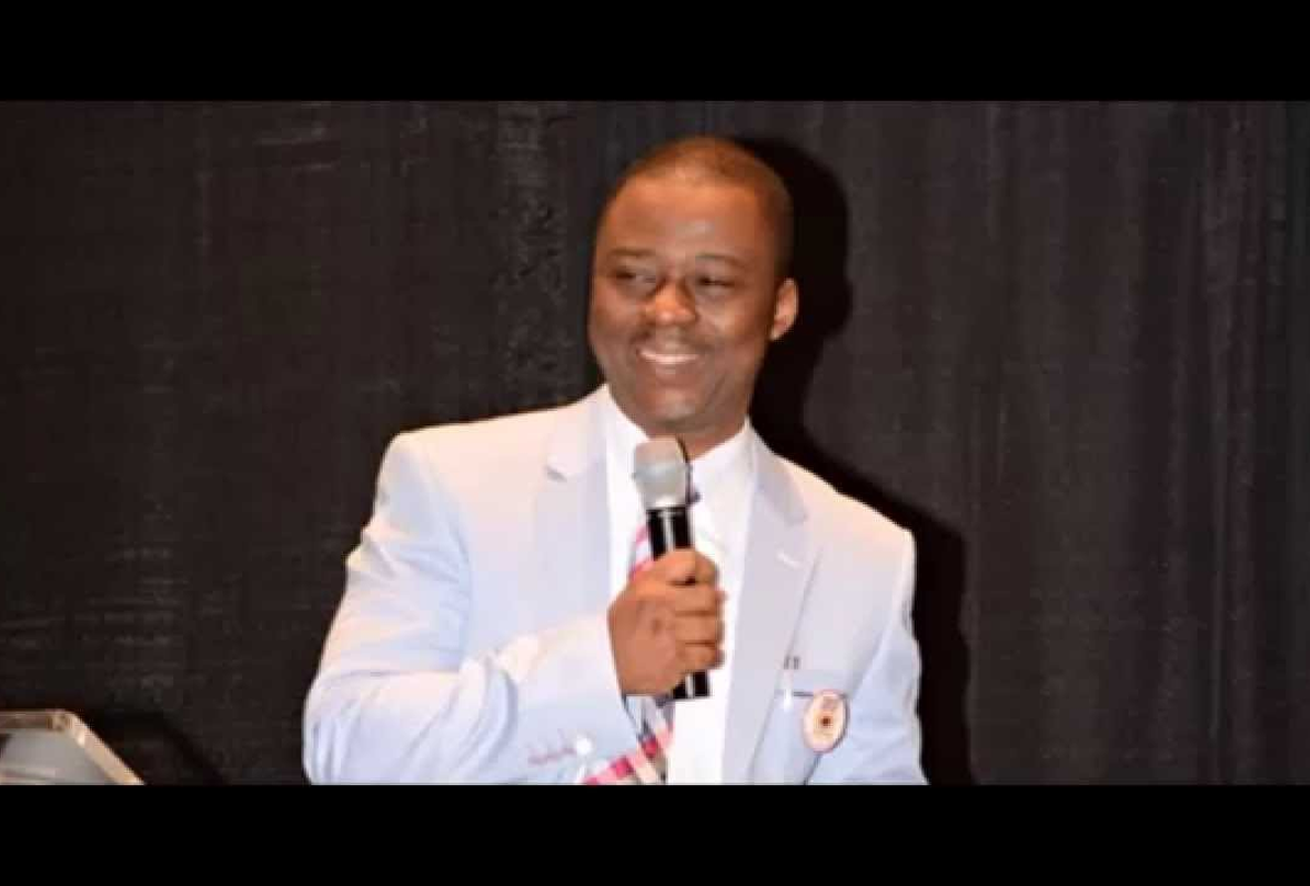 Dr. D. K. Olukoya sharing a message
